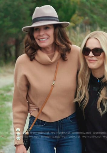 Luann’s beige pearel button cuff on The Real Housewives of New York City