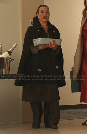 Maggie’s black double breasted cape coat on Younger