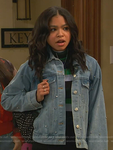 Nia’s green striped sweater and studded denim jacket on Ravens Home