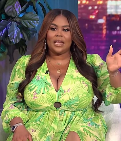 Nina’s green tropical print dress on E! News Nightly Pop