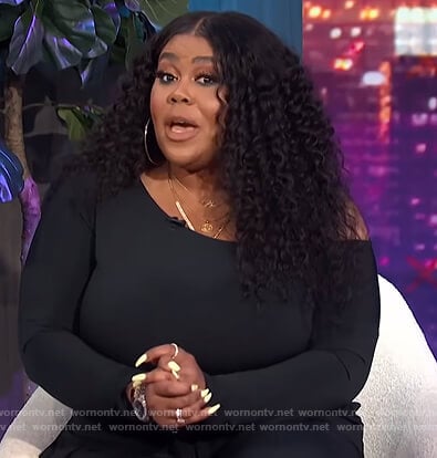 Nina’s black off shoulder jumpsuit on E! News Nightly Pop