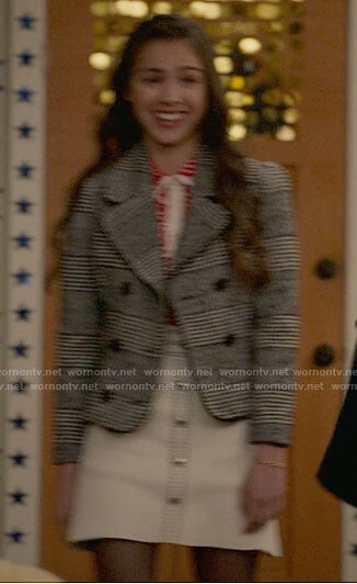 Nini’s plaid jacket, heart print shirt and white skirt on High School Musical The Musical The Series