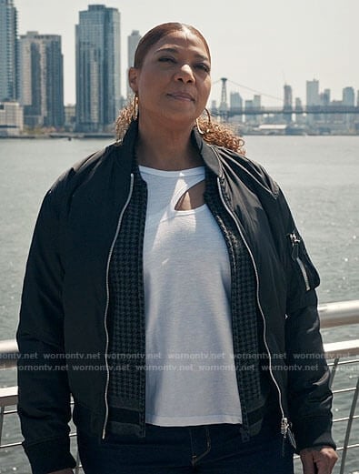 Robyn’s white cutout tee, houndstooth jacket and bomber jacket on The Equalizer