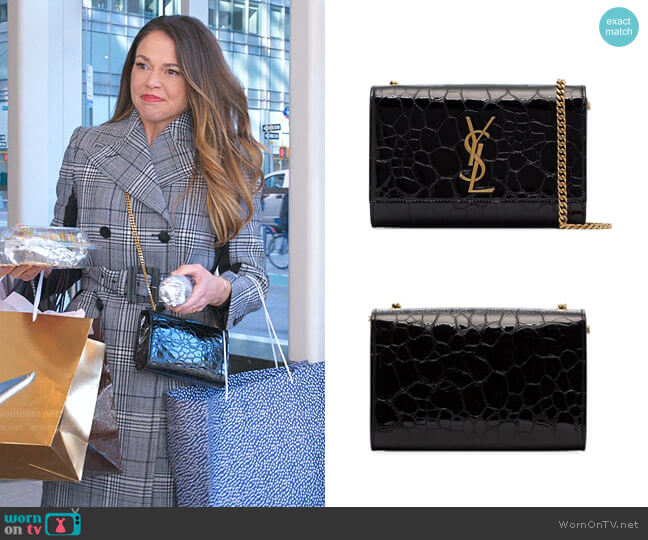 Saint Laurent Kate Crocodile Embossed Leather Shoulder Bag worn by Liza Miller (Sutton Foster) on Younger