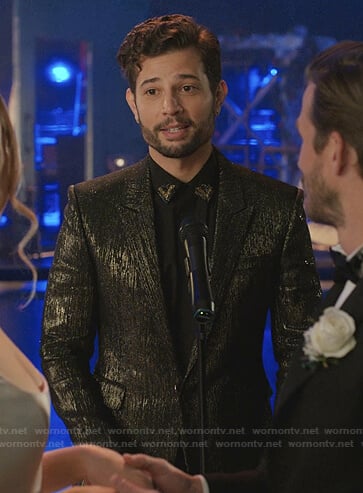 Sam’s black embellished collar shirt and metallic jacket on Dynasty
