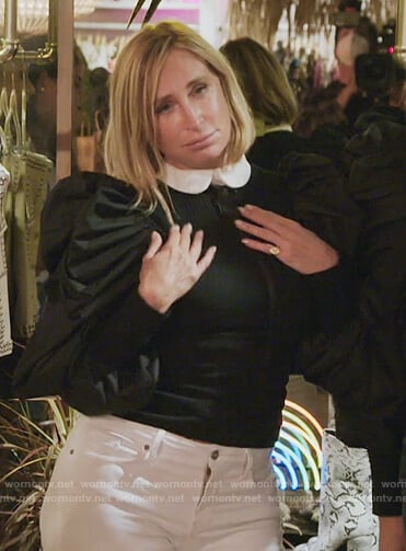 Sonja’s black puff sleeve sweater on The Real Housewives of New York City