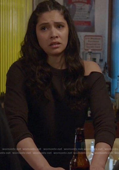 Stella’s black sweatshirt with shoulder cutout on Chicago Fire