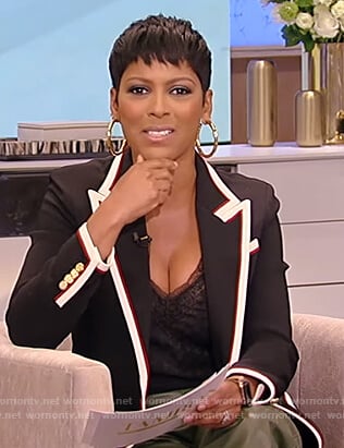 Tamron’s black tipped blazer and leather pants on Tamron Hall Show