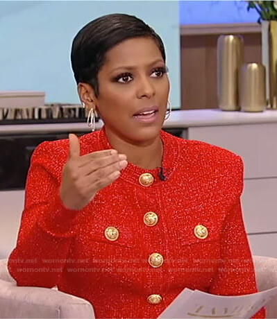 Tamron’s red button embellished knit top and floral skirt on on Tamron Hall Show