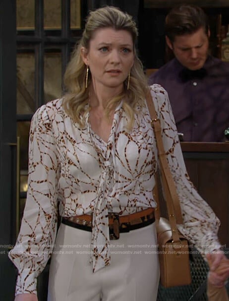 Tara’s white printed tie neck blouse on The Young and the Restless