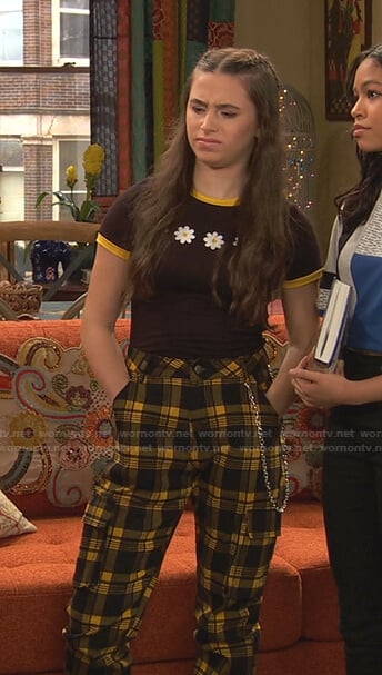 Tess’s brown floral tee and yellow plaid pants on Ravens Home