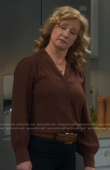 Vanessa’s brown v-neck blouse on Last Man Standing