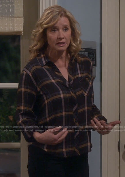 Vanessa’s black plaid shirt on Last Man Standing