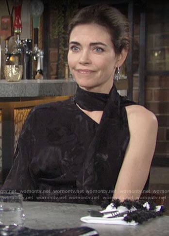 Victoria’s black one-shoulder scarf neck blouse on The Young and the Restless