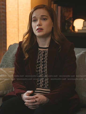 Zoey’s black and beige monogram sweater on Zoeys Extraordinary Playlist
