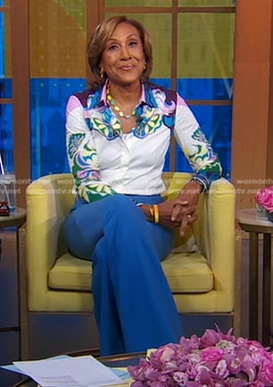 Robin’s abstract print blouse and blue pants on Good Morning America