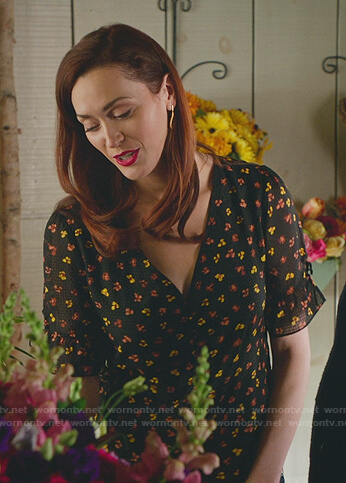 Abigail’s  black floral v-neck short sleeve top on Good Witch