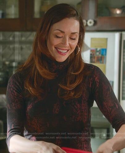 Abigail’s red snake print top on Good Witch