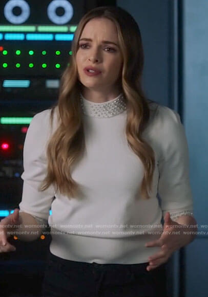 Caitlin’s white pearl neck sweater on The Flash