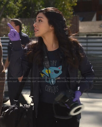Ella’s navy Stay Curious cat print tee on Lucifer
