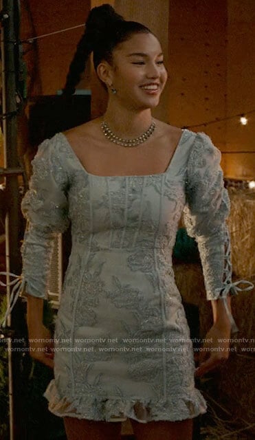 Gina’s blue dress with lace-up sleeves on High School Musical The Musical The Series
