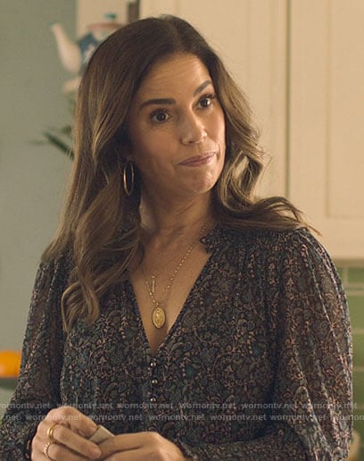 Isabel’s blue floral blouse on Love Victor