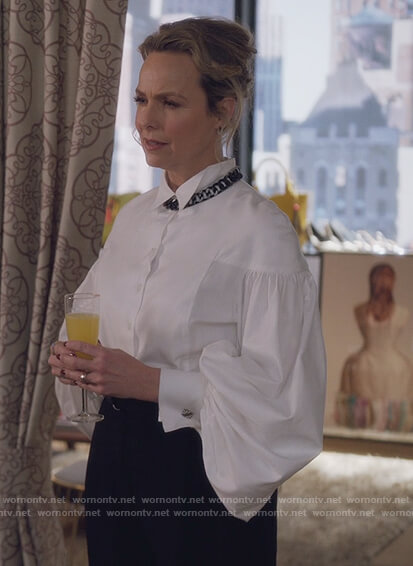 Jacqueline’s white puff sleeve blouse and necklace on The Bold Type