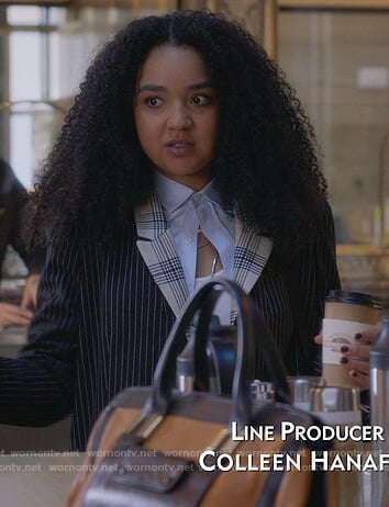 Kat’s black pinstripe coat on The Bold Type