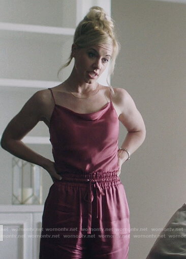 Kelly Anne’s red satin jumpsuit on Queen of the South
