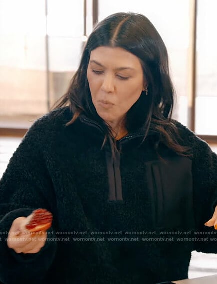 Kourtney’s black fleece sweater on Keeping Up with the Kardashians
