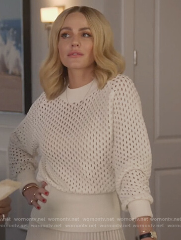 Laura’s white eyelet sweater on All American