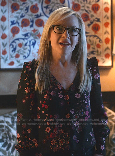 Linda’s black floral print blouse on Lucifer