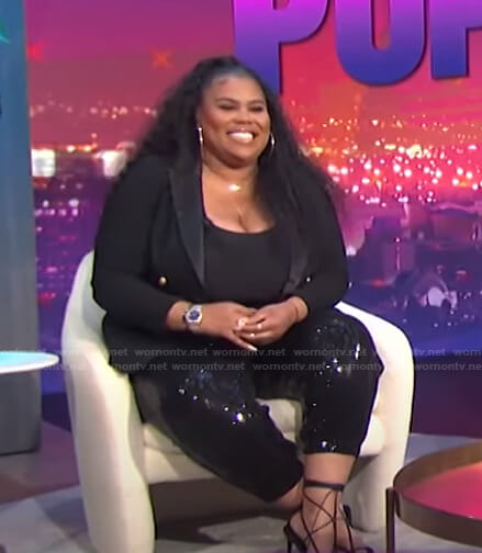 Nina’s black sequin pants on E! News Nightly Pop