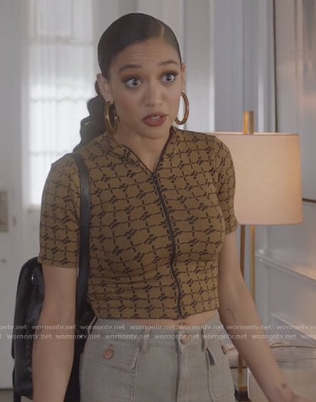 Olivia’s brown printed zip top on All American