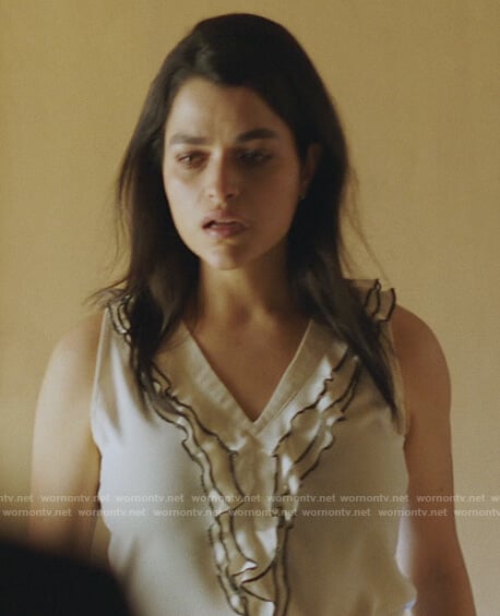 Samara’s white ruffled top on Queen of the South