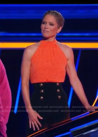 Sara’s black high waist pants with gold buttons on The Chase