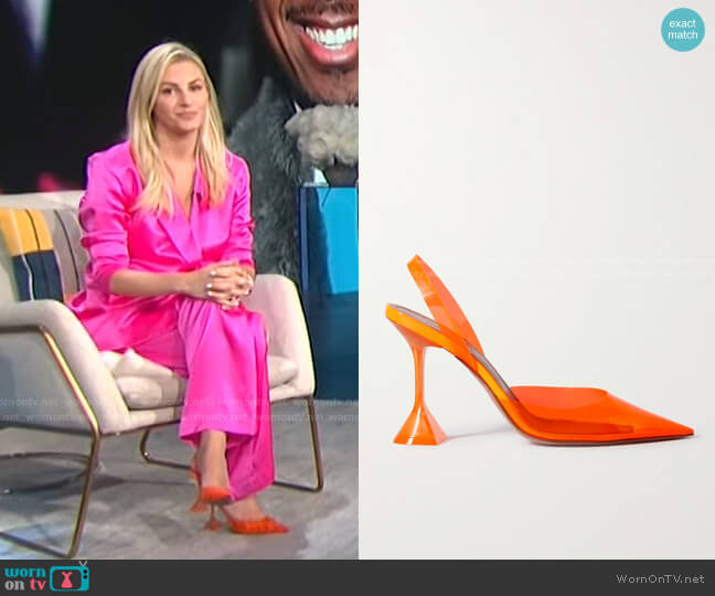 Amina Muaddi Holli Glass Neon PVC Slingback Pumps worn by Morgan Stewart on E! News