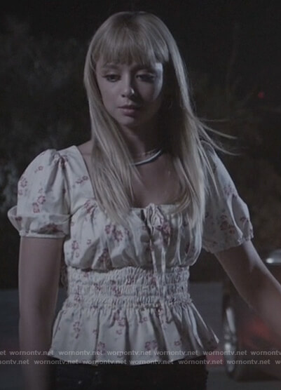 Carrie’s white floral print smocked waist top on All American