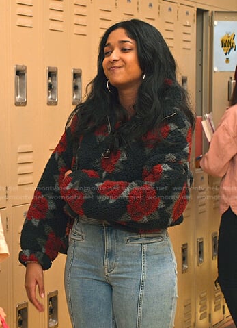 Devi’s black floral sherpa sweatshirt and jeans on Never Have I Ever