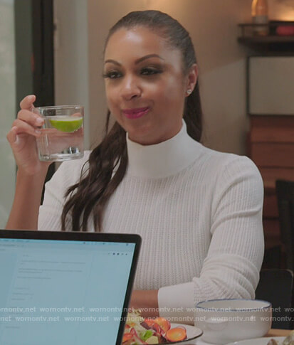 Ebony’s white turtleneck sweater on The Real Housewives of New York City