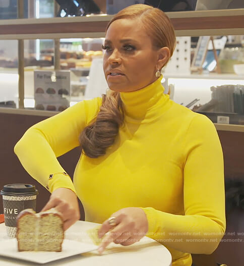 Gizelle’s yellow turtleneck sweater on The Real Housewives of Potomac