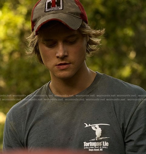 JJ’s Tortugas Lie t-shirt and International Harvester hat on Outer Banks