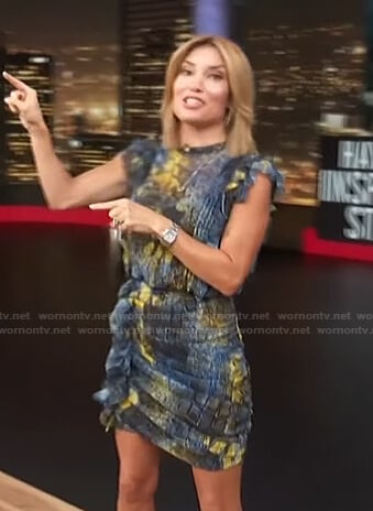 Kit’s blue snakeskin print ruffle mini dress on Access Hollywood