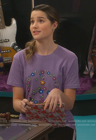 Lex’s purple floral peace tee on Side Hustle
