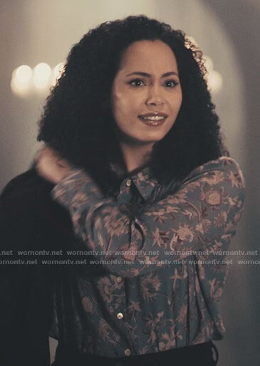 Macy’s blue floral blouse on Charmed