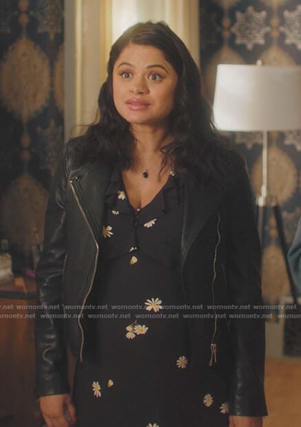 Mel’s black daisy dress and leather jacket on Charmed