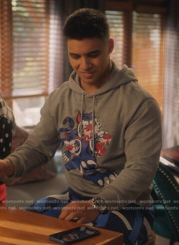Kenzo’s gray tiger print hoodie and printed pants on Grown-ish
