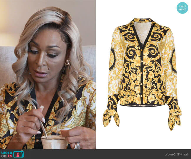 Versace V-neck Baroque-print blouse worn by Karen Huger on The Real Housewives of Potomac