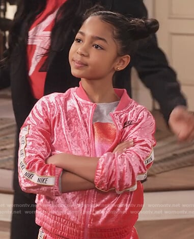 Ami’s pink velour Nike trackshit on Family Reunion