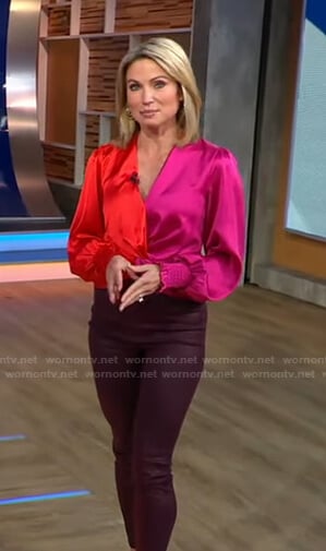 Amy’s red and pink colorblock top and burgundy pants on Good Morning America